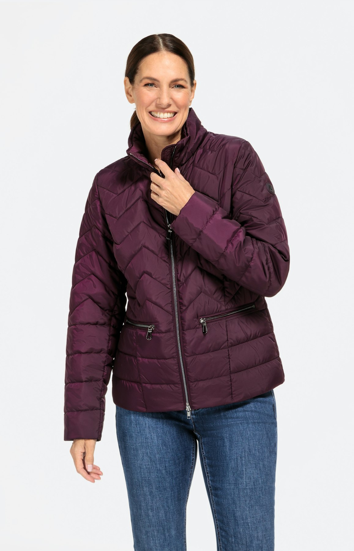 Steppjacke mit versteckter Kapuze
