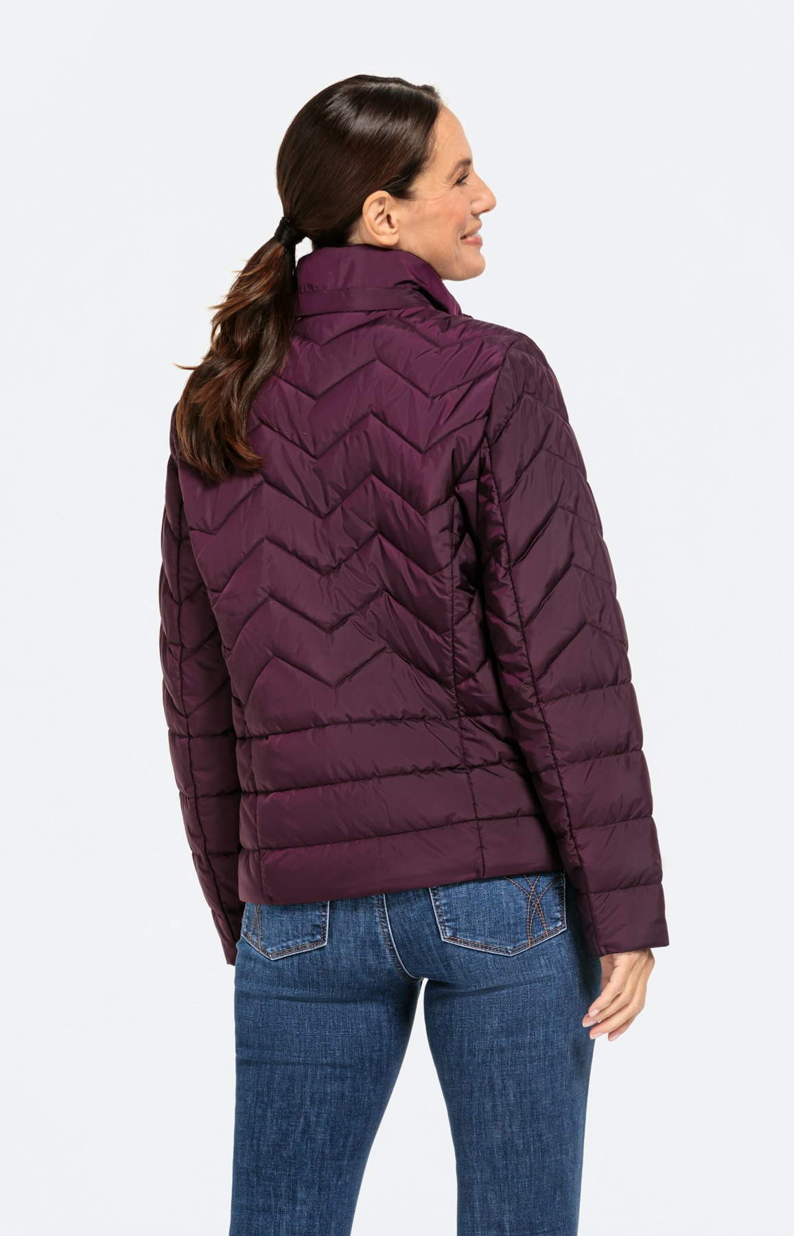 Steppjacke mit versteckter Kapuze