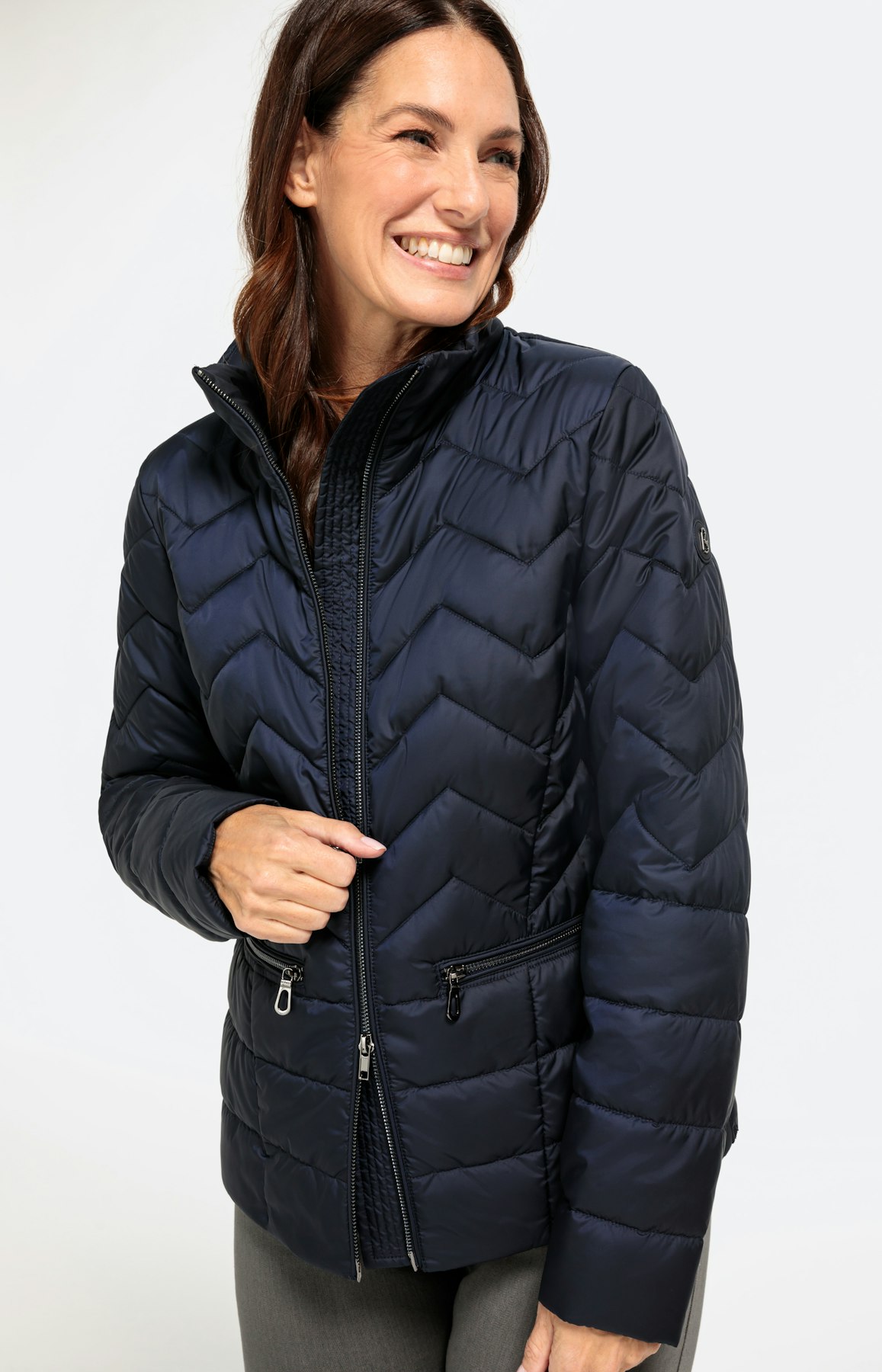 Steppjacke mit versteckter Kapuze