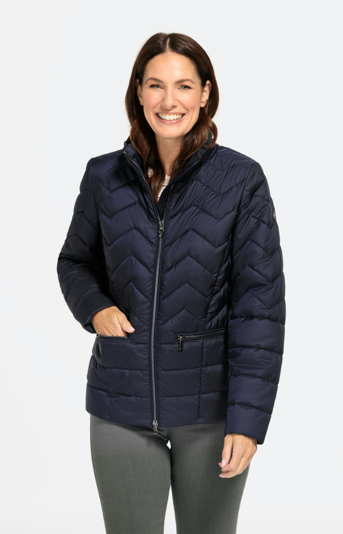 Steppjacke mit versteckter Kapuze