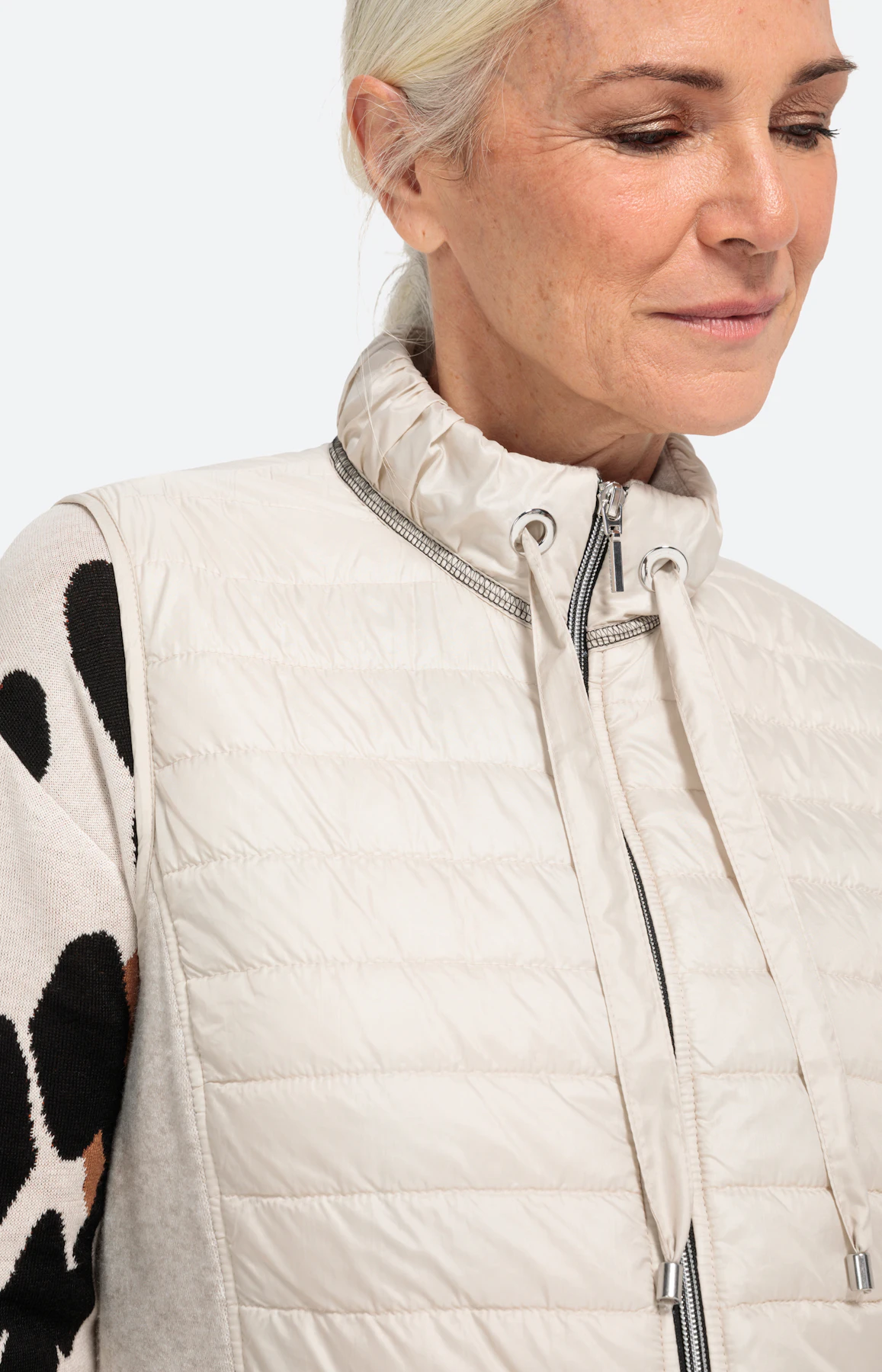 Dunne bodywarmer met stretchinzetten