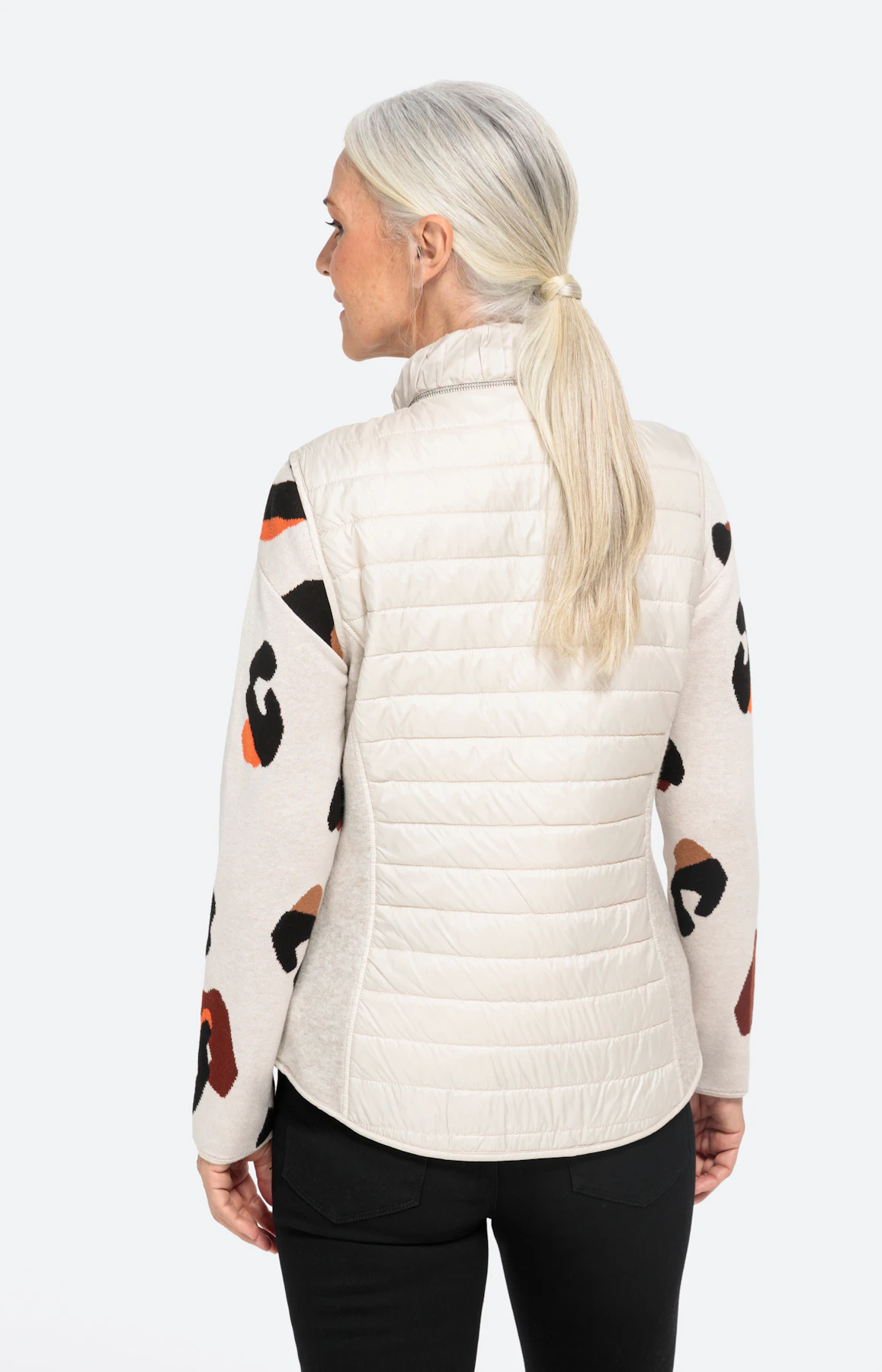 Dunne bodywarmer met stretchinzetten