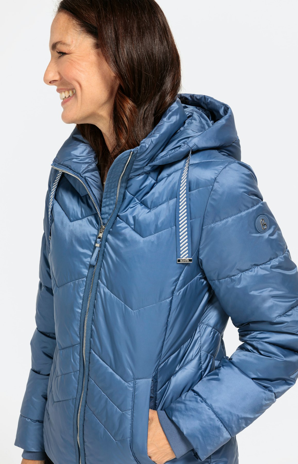 Gewatteerd jack met capuchon en boorden