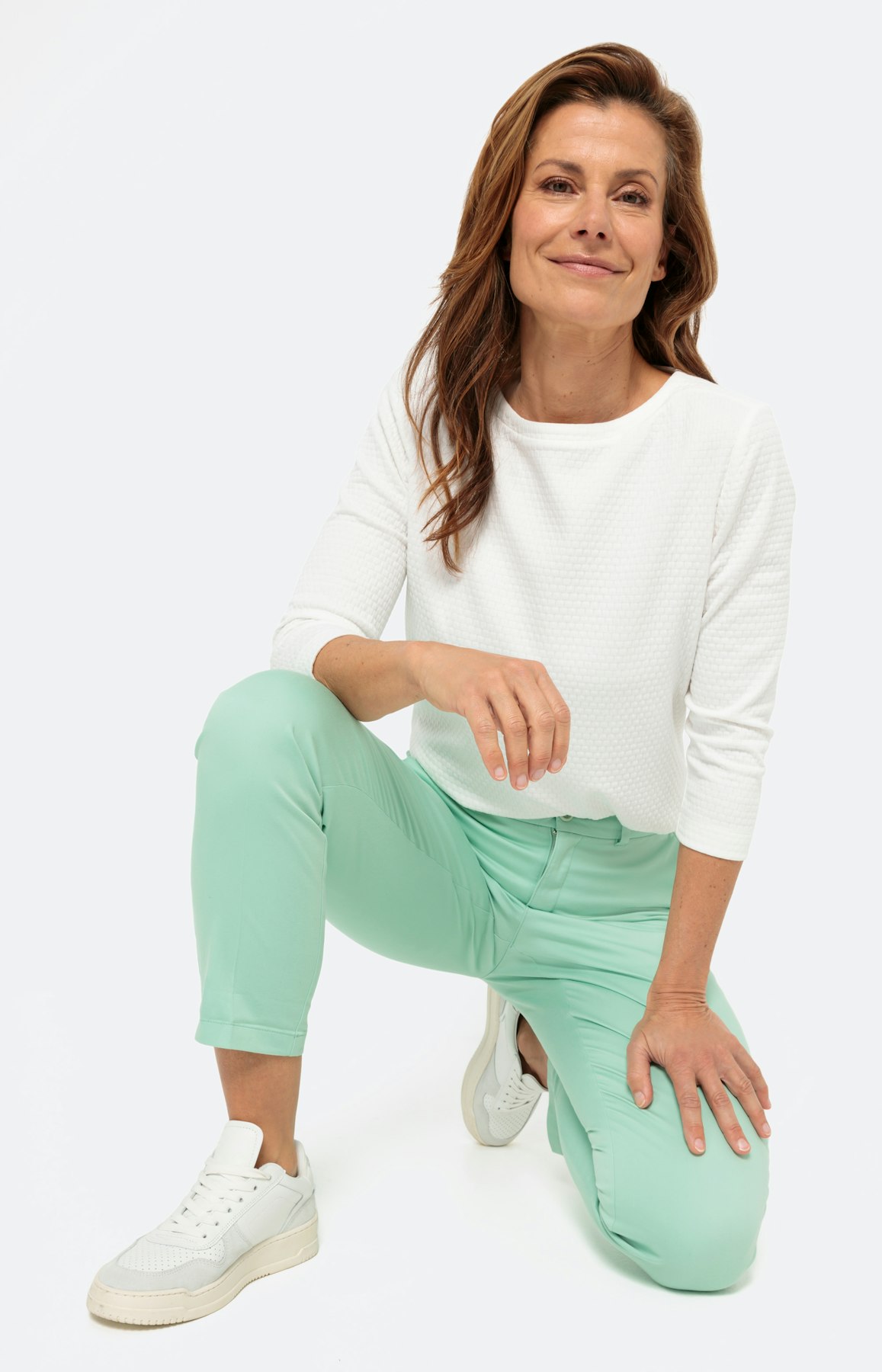 Chino met persplooien