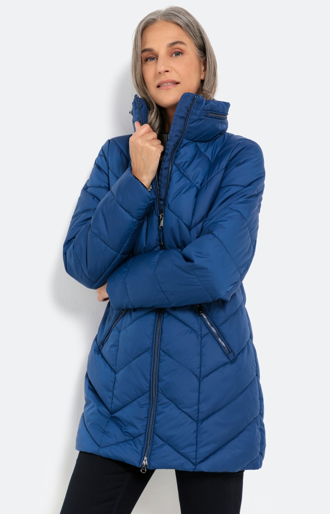 Gewatteerde jas met verborgen capuchon