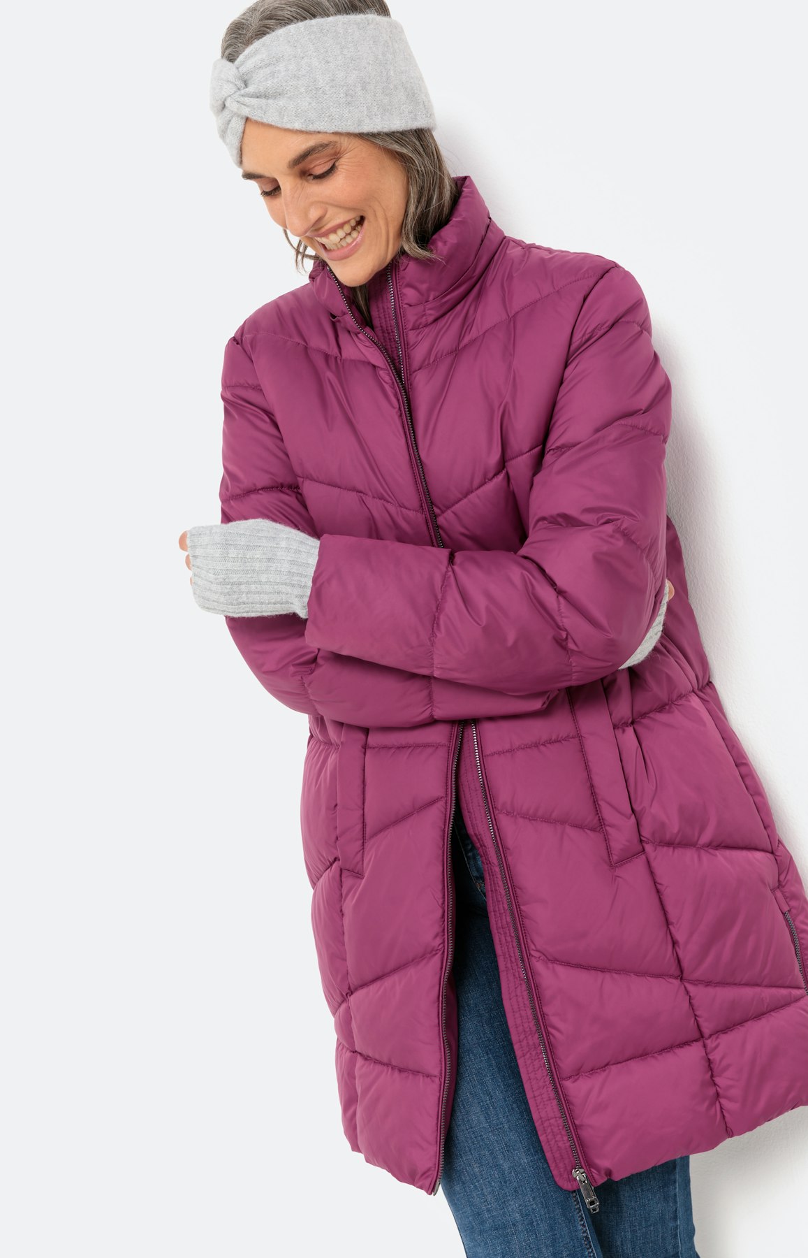 Doorgestikte mantel met ritsen opzij