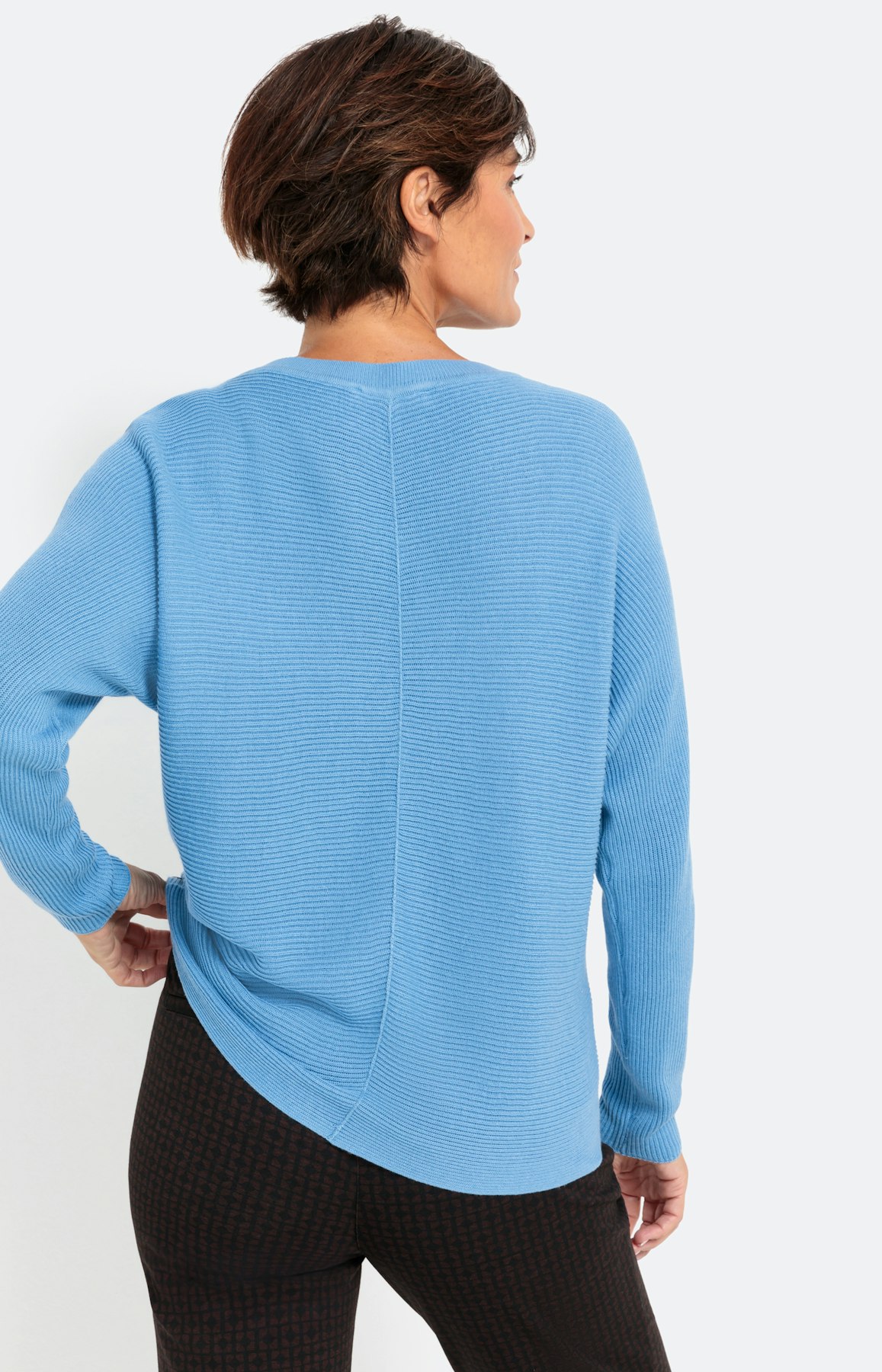 Gebreide trui met lange vleermuismouwen