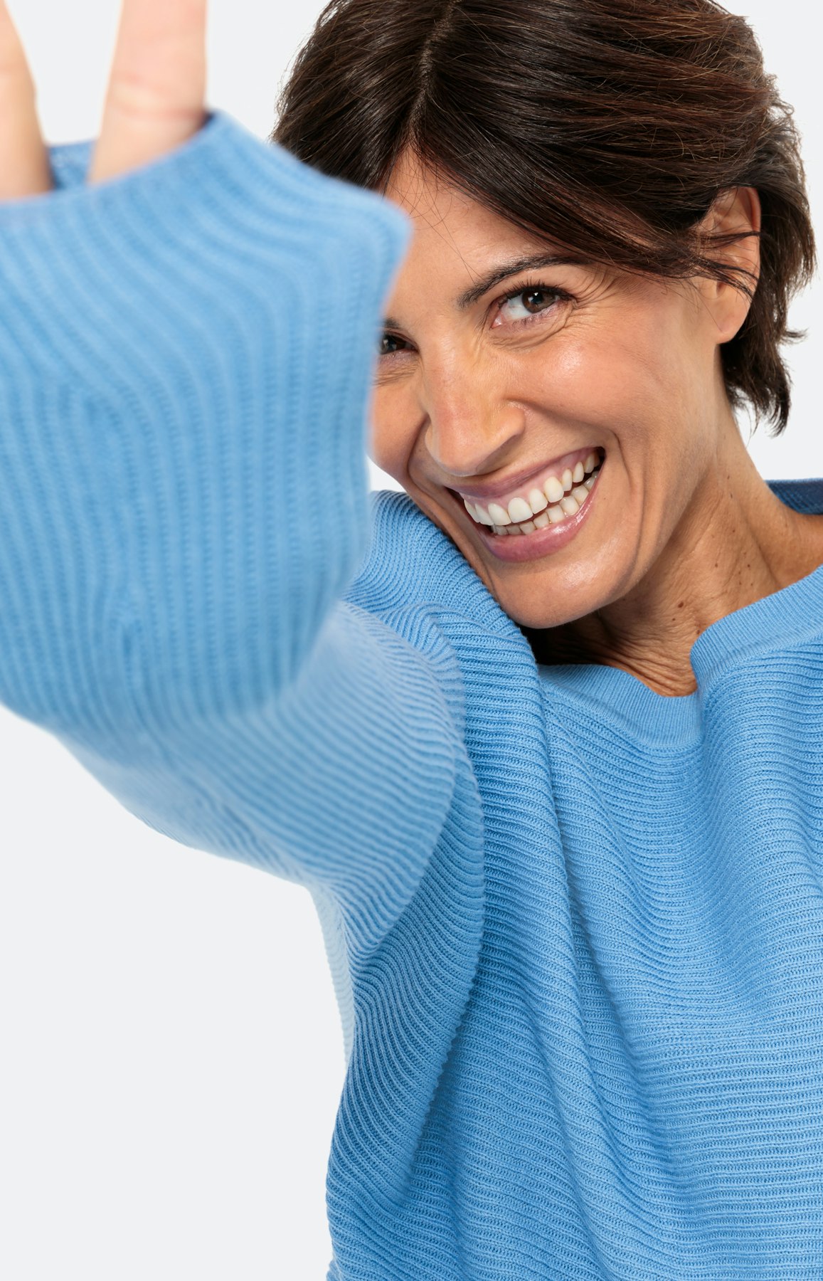 Gebreide trui met lange vleermuismouwen