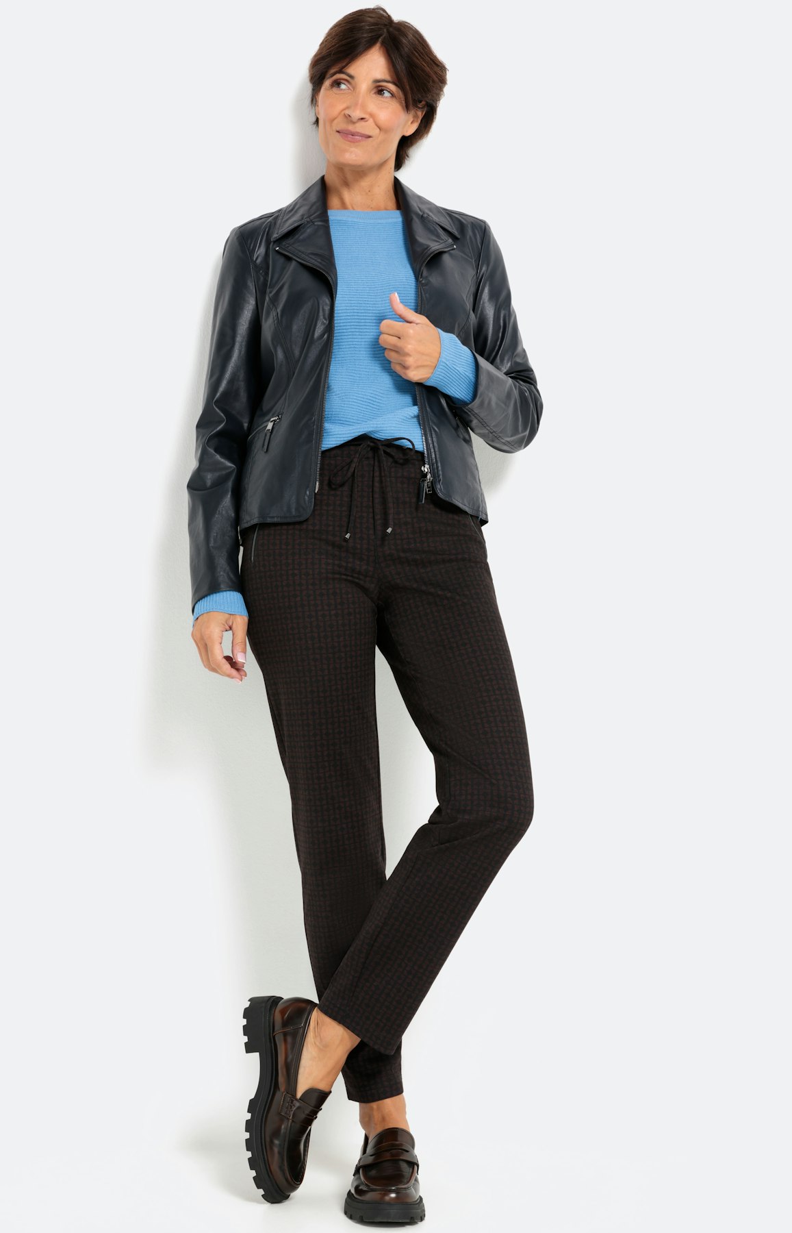 Gebreide trui met lange vleermuismouwen