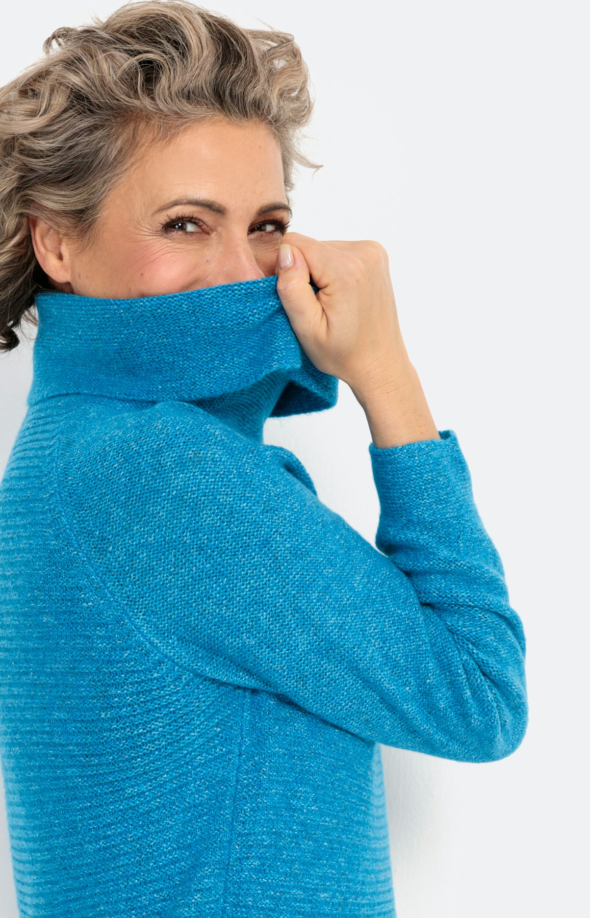 Gestreepte trui met effen mouwen