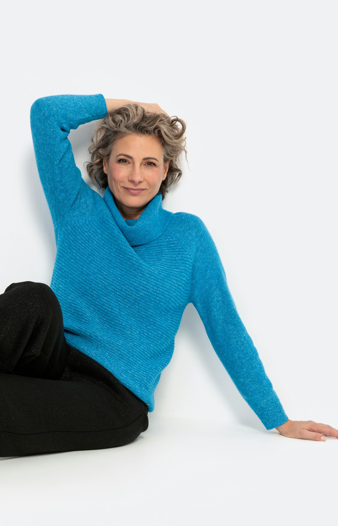 Gestreepte trui met effen mouwen