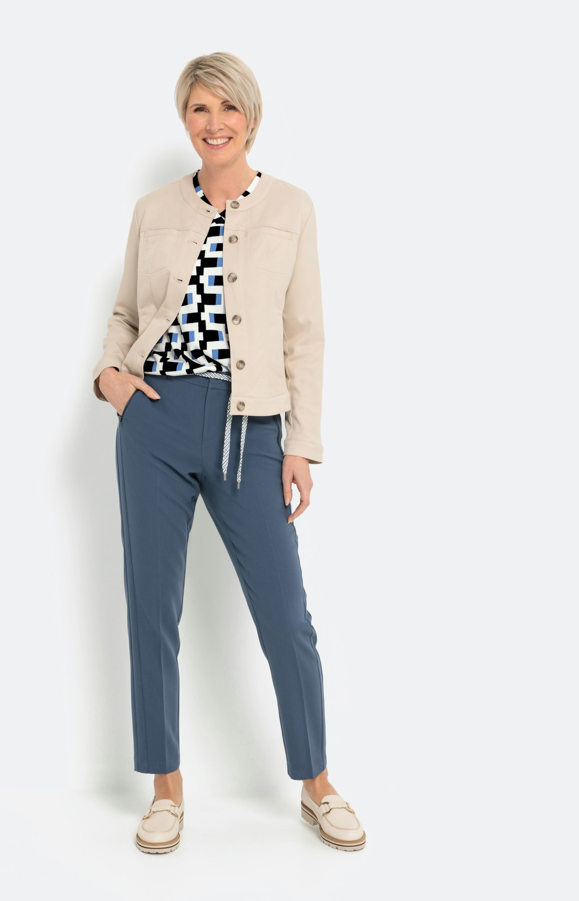 Broek met smalle pijpen en bindceintuur