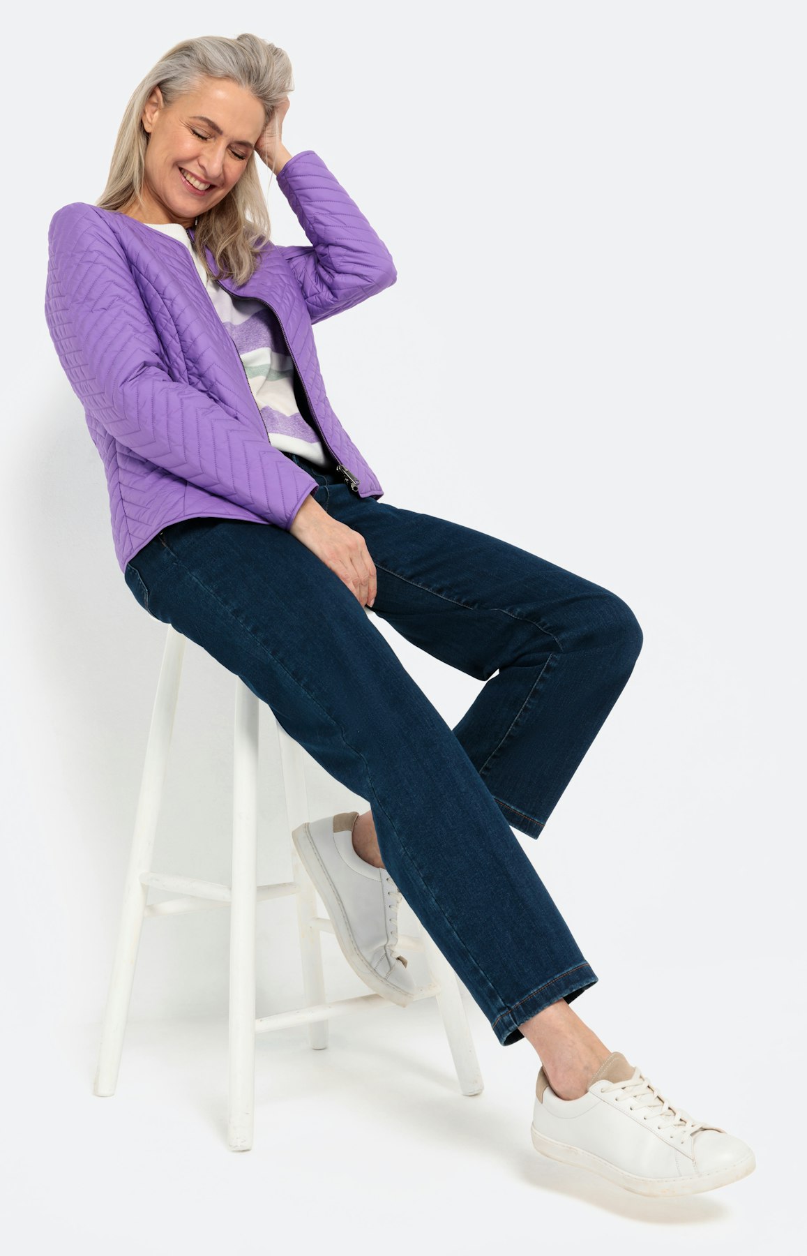 Licht jasje met zigzagstiksels