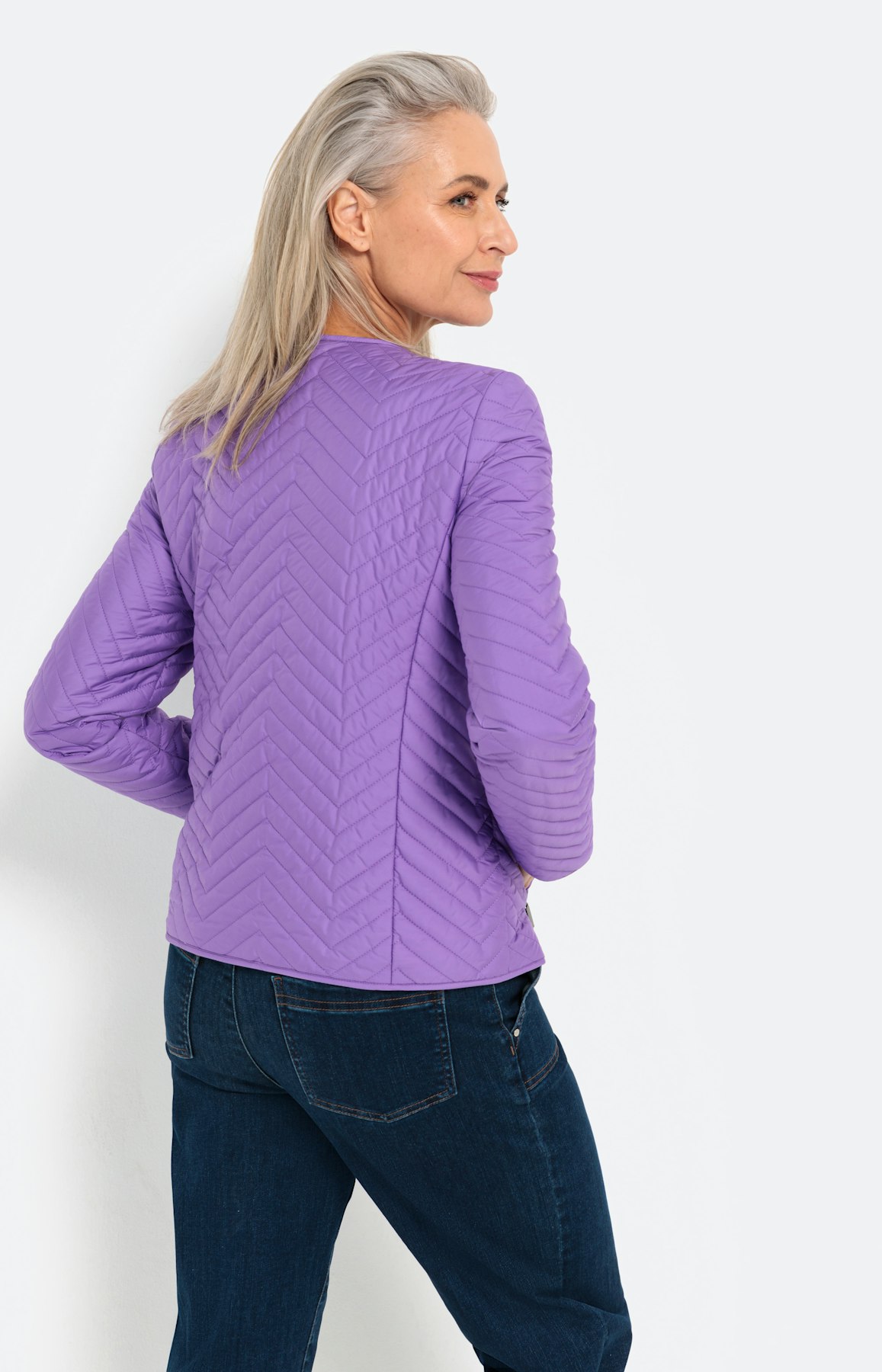 Licht jasje met zigzagstiksels