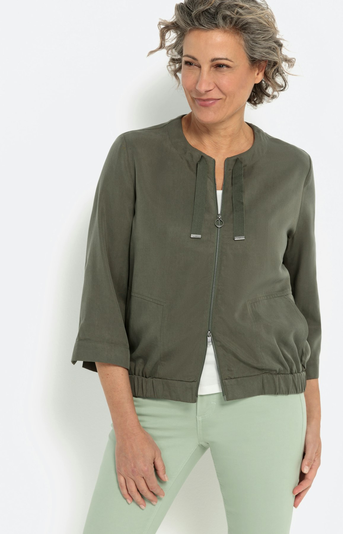 Soepele jas met 3/4-mouwen en rits