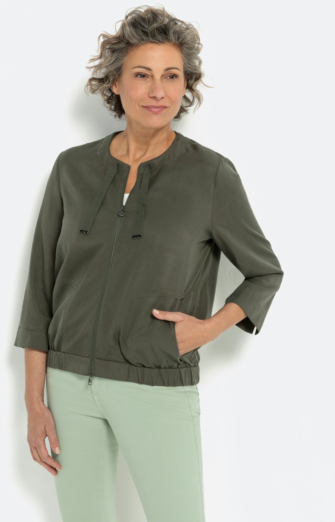 Soepele jas met 3/4-mouwen en rits