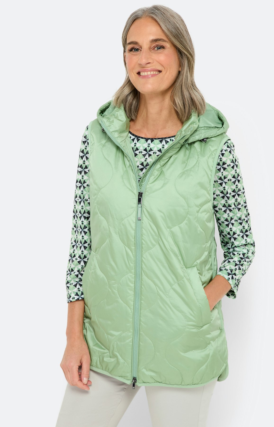 Wijde bodywarmer met capuchon in mint