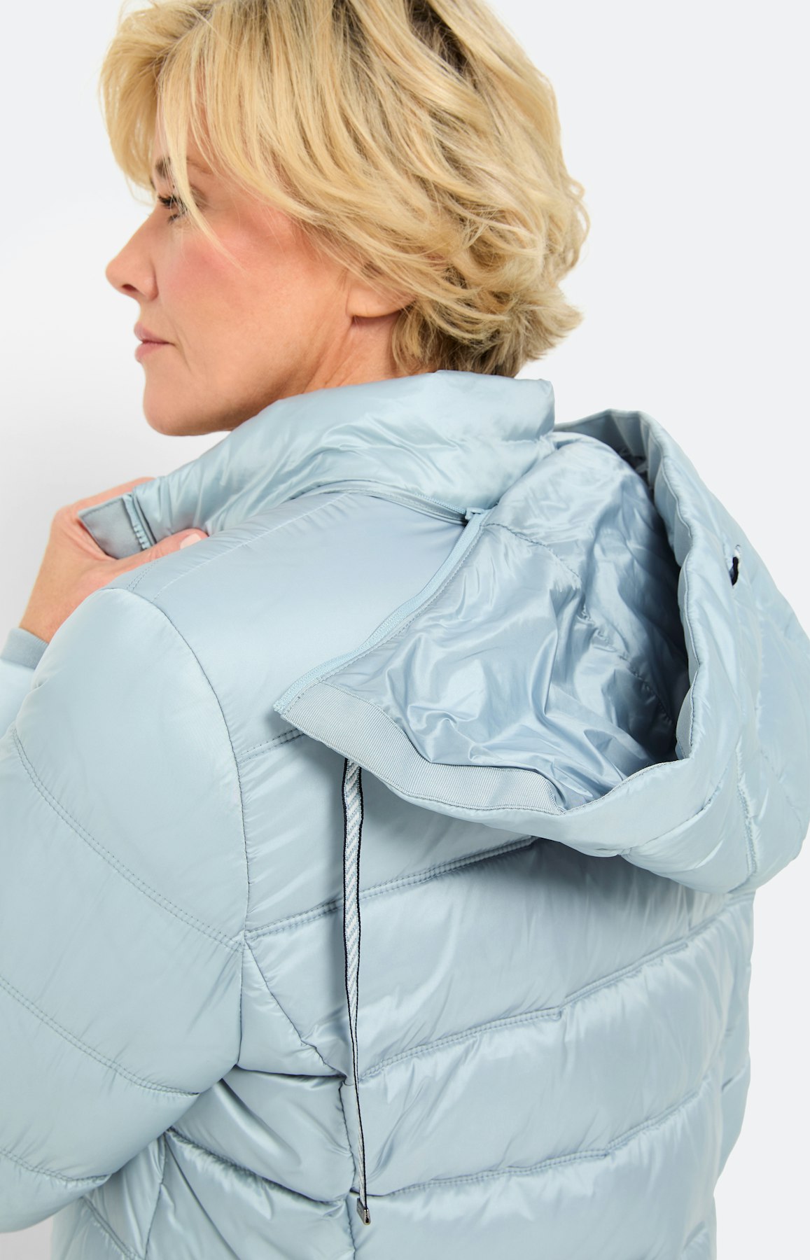 Doorgestikte mantel met zijsplit, blauw